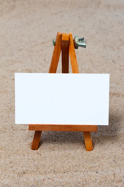Easel on the sand — Stock Photo, Image