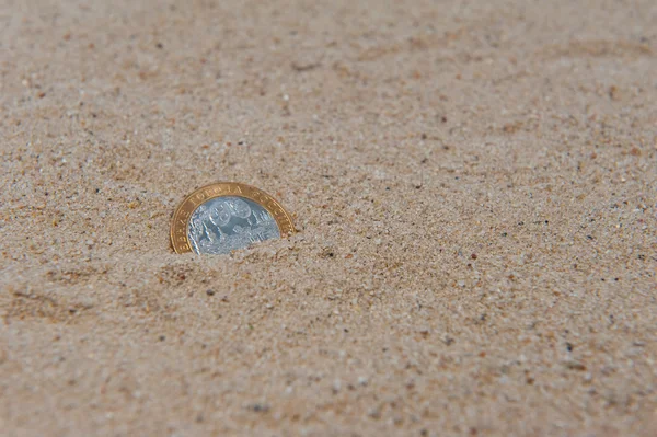 Mince v písku — Stock fotografie