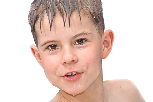 Un ragazzo nuota nella vasca da bagno — Foto Stock