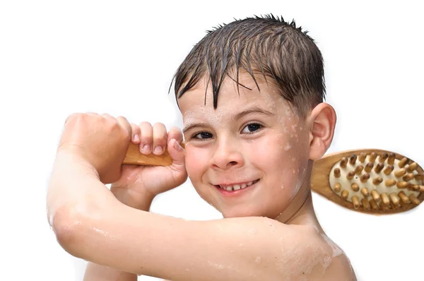 Мальчик плавает в ванной — стоковое фото