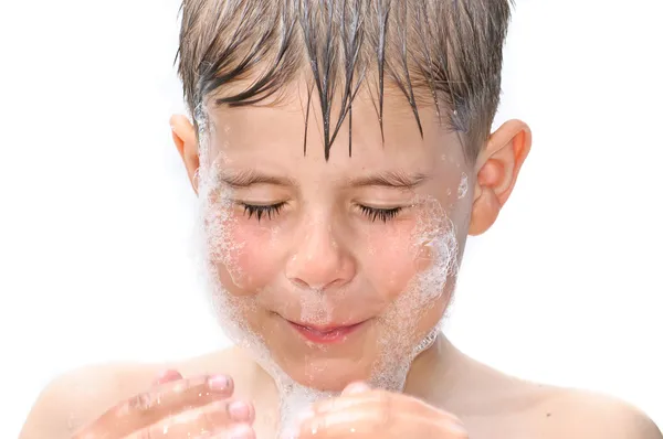 A boy swims in the bathtub — Stock Photo, Image