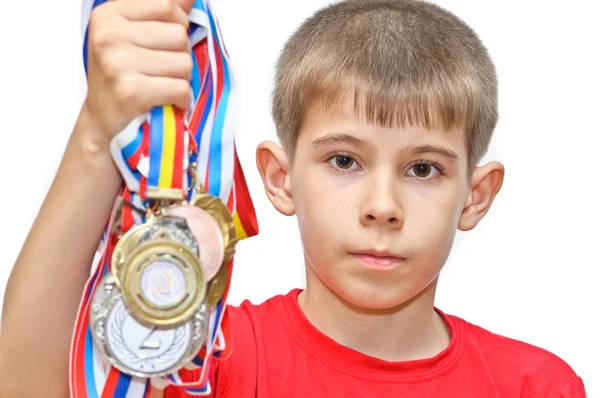 Menino-atleta com medalhas — Fotografia de Stock