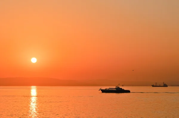 stock image The boats are under the sunset.