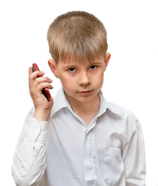 Um rapaz com um telemóvel — Fotografia de Stock