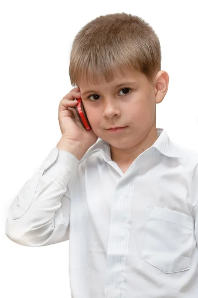 Um rapaz com um telemóvel — Fotografia de Stock