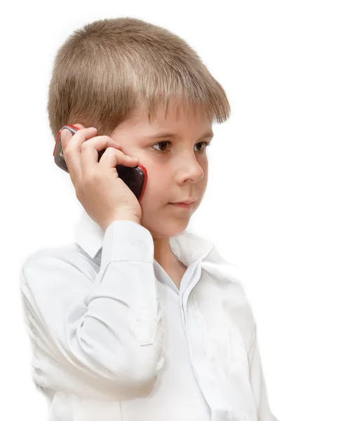 Een jongen met een mobiele telefoon — Stockfoto