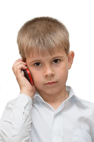 A boy with a cell phone Royalty Free Stock Photos