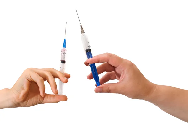 Kézzel, egy injekciós tűvel — Stock Fotó