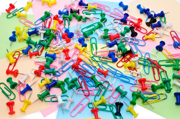 Colored paper clips and pins Stock Picture