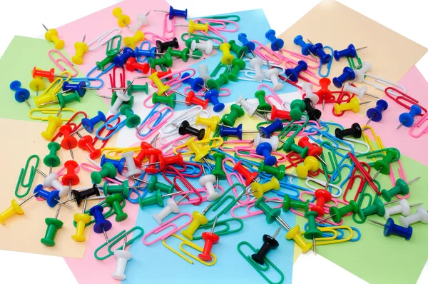 Colored paper clips and pins Stock Photo