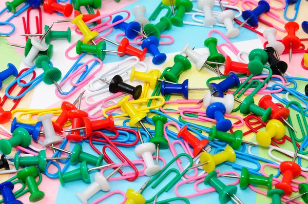 Colored paper clips and pins Stock Image