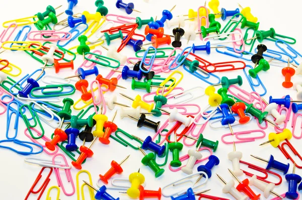 Colored paper clips and pins Stock Photo
