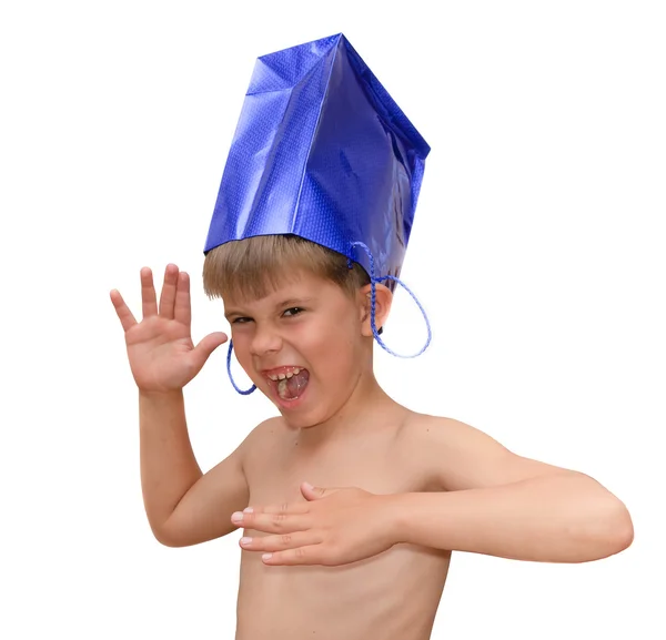 Een jongen met een zak om te winkelen — Stockfoto