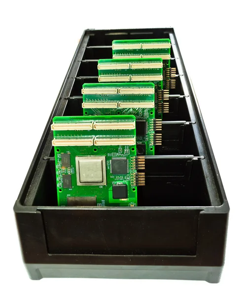 Varias placas de circuitos impresos en un contenedor —  Fotos de Stock