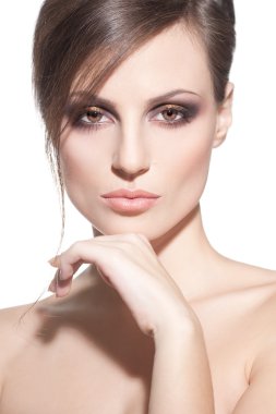 Face of a sexy young brunette woman with perfect skin clipart