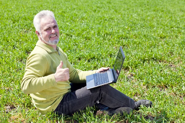 Happy man with a notebook — Stock Photo, Image