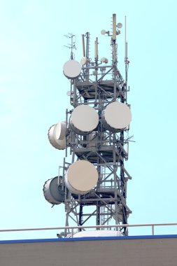 Booster and antennas on the sky clipart