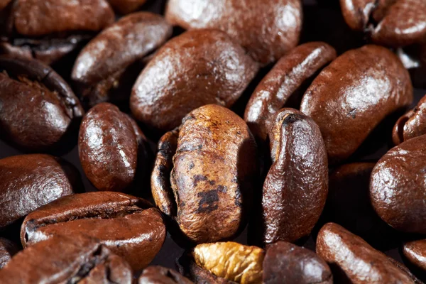 Pile of roasted black coffee. Stock Picture