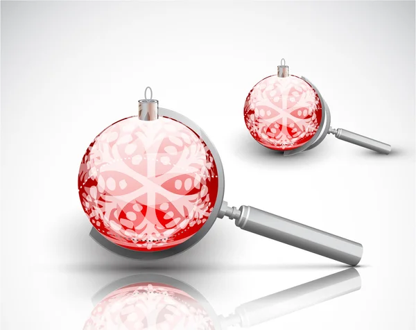 Lupa vectorial con bola de Navidad — Vector de stock