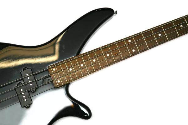 Fragment of black Bass Electric Guitar With Four Strings, isola — Stock Photo, Image