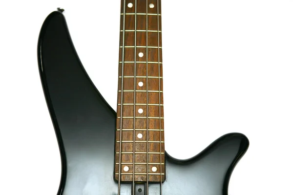 Fragmento de baixo preto guitarra elétrica com quatro cordas — Fotografia de Stock