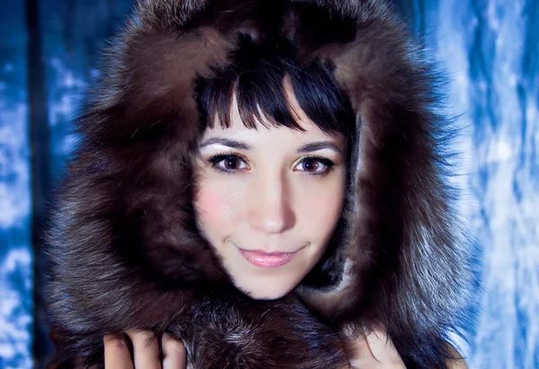 stock image Portrait of a girl in a fur hat