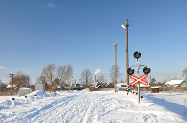 Unguarded railway crossing. clipart