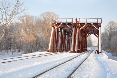 Railway bridge in the winter. clipart