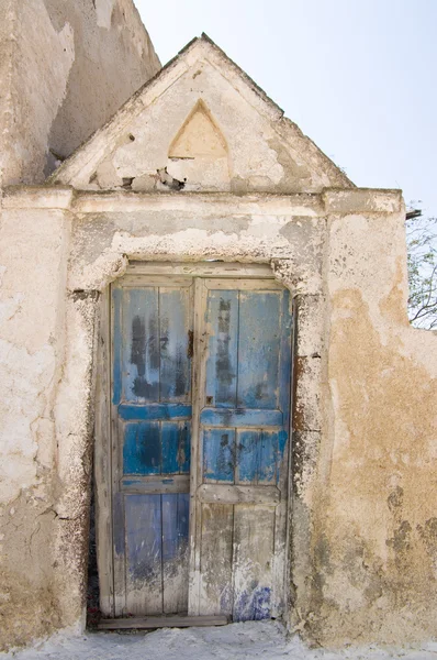 Peeling blue doors, Akrotiri, Santorini. — Stock Photo, Image