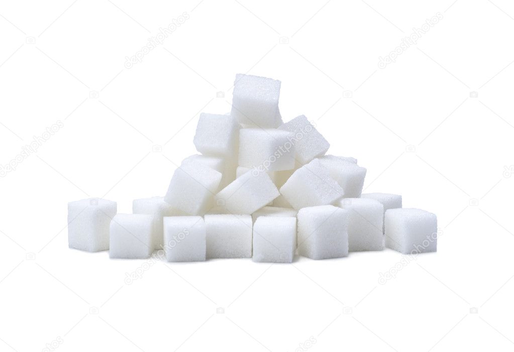 Random pile of sugar cubes on white