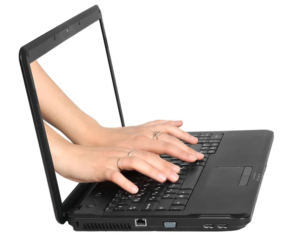 Female typing on laptop from the monitor — Stock Photo, Image