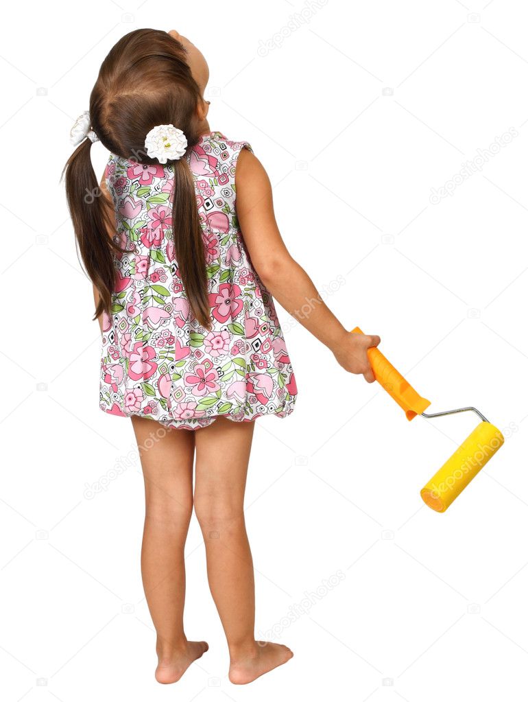 Little girl with roller for paint