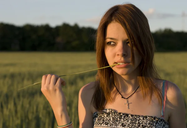Girl and cereal crop — Stock Photo, Image