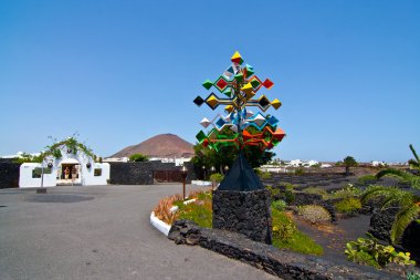 Entrance and sculpure of an artist, Lanzarote,Spain clipart
