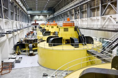 Inside the Glen Canyon dam in Page with view to the turbines clipart