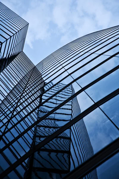 Glass front of office tower — Stock Photo, Image