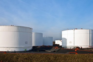 White tanks in tank farm clipart