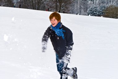 Children having fun in the snow clipart