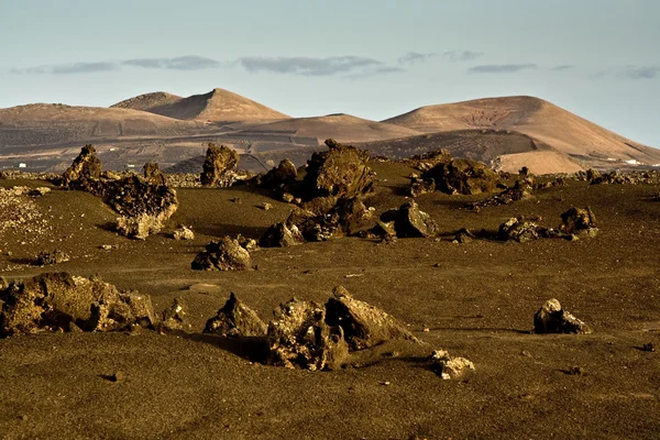 Вулканічний пейзаж на заході сонця — стокове фото