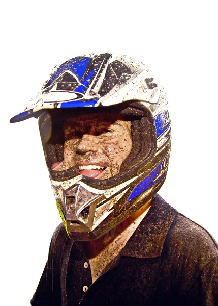 У парня грязь на лице от вождения Квада — стоковое фото