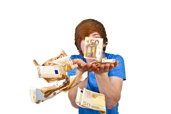 Euros flying around a boys head — Stock Photo, Image