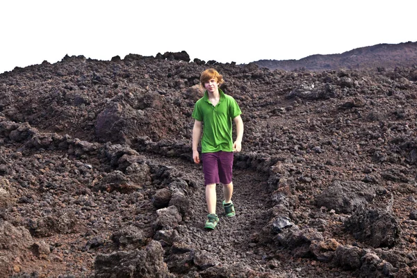 Chłopiec w wulkanicznym obszarze — Zdjęcie stockowe