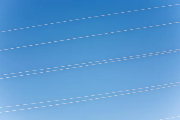 Electricity high voltage tower with blue sky — Stock Photo, Image