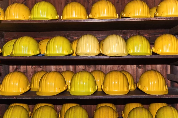 Yellow helmets for visitors at the gem mine — Stock Photo, Image