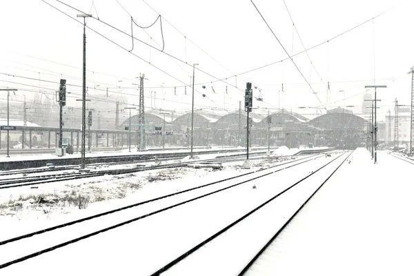 Train in Wintertime on track in snow flurry — Stock Photo, Image