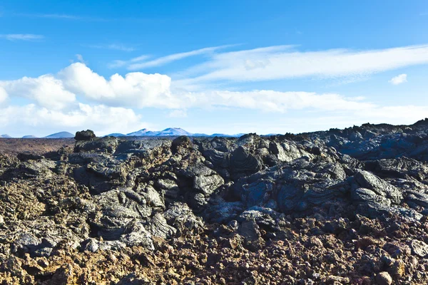 Kamienie wulkaniczne przepływu dać piękną strukturę — Zdjęcie stockowe