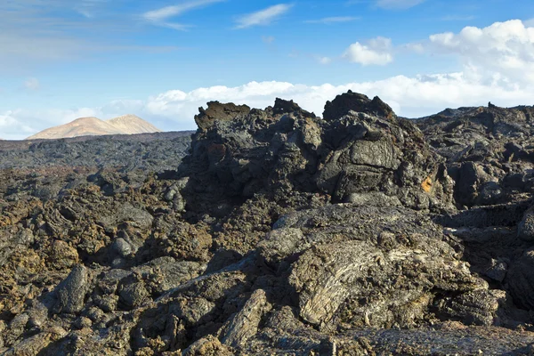 Kövek a vulkáni áram egy gyönyörű strukturálni — Stock Fotó