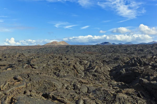 Stenen van vulkanische stromen geven een mooie structuur — Stockfoto