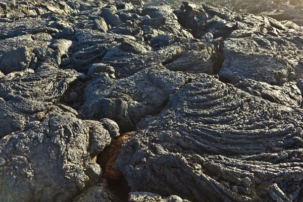 Камни вулканического потока придают красивое строение — стоковое фото