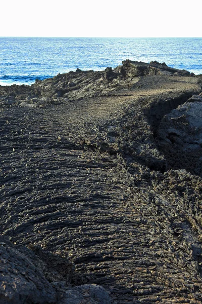 ज्वालामुखीचा प्रवाह दगड एक सुंदर रचना देतात — स्टॉक फोटो, इमेज